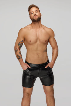 Men’s black mid-length snake-pattern wetlook shorts, front view.
