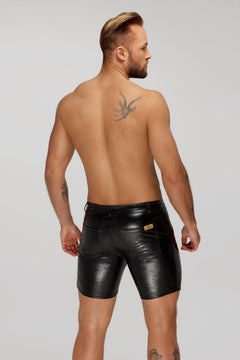 Men’s black mid-length snake-pattern wetlook shorts with back pockets, rear view.