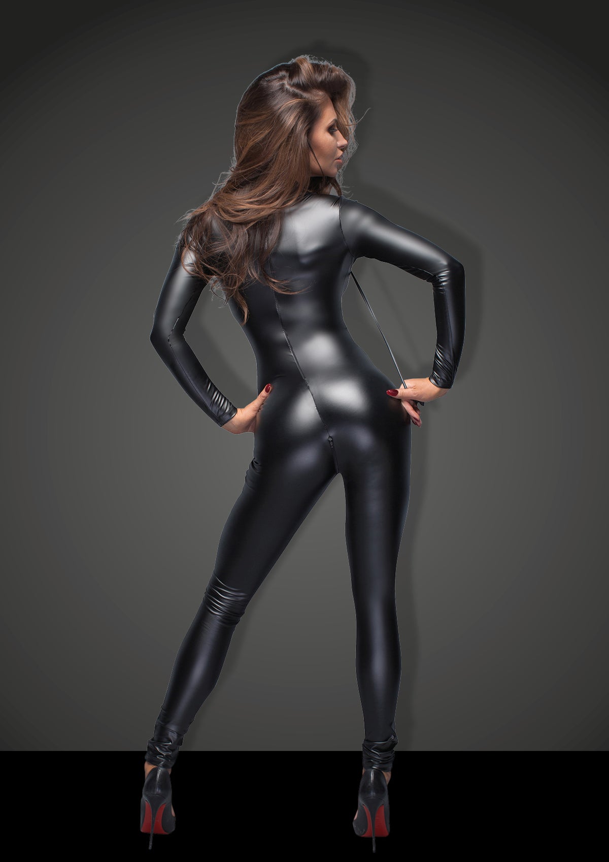 model wearing black Catsuit with leash back view